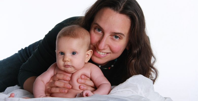 Photo of Jennifer Margulis, Ph.D., author of Your Baby, Your Way, and her 4-month-old daughter Leone. Photo by Christopher Briscoe.
