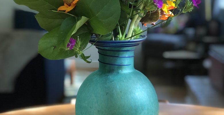 Tamiflu alternatives: better, safer remedies via JenniferMargulis.net photo of a bouquet of flowers in a blue vase