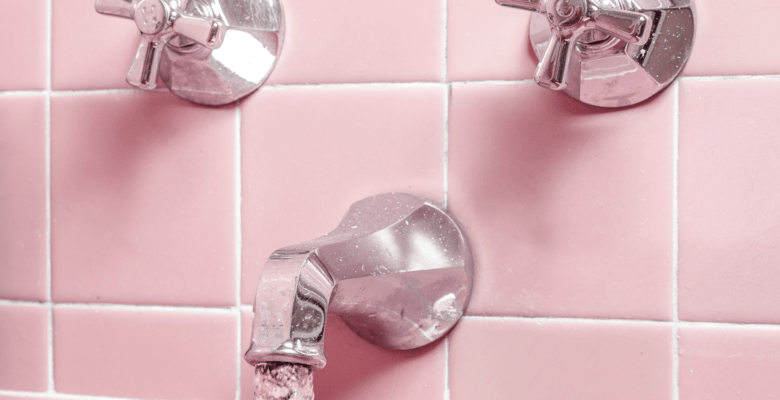 Uses for gray water: 5 great ideas. Photo of a pink shower with running water via Unsplash. | Jennifer Margulis, Ph.D.