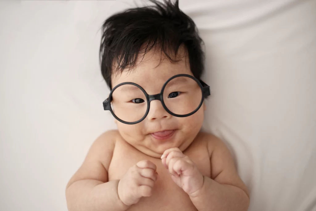 Censorship continues. Especially of natural health information and vaccine safety concerns. Photo of a baby wearing glasses courtesy of Unsplash. | Jennifer Margulis, Ph.D.