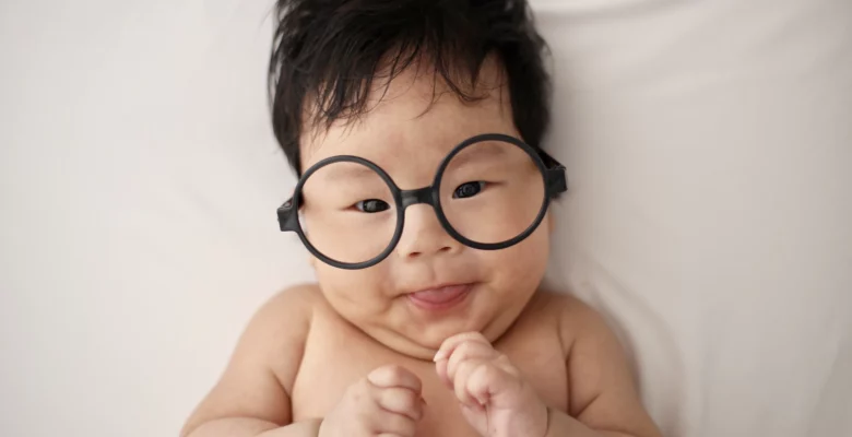 Censorship continues. Especially of natural health information and vaccine safety concerns. Photo of a baby wearing glasses courtesy of Unsplash. | Jennifer Margulis, Ph.D.